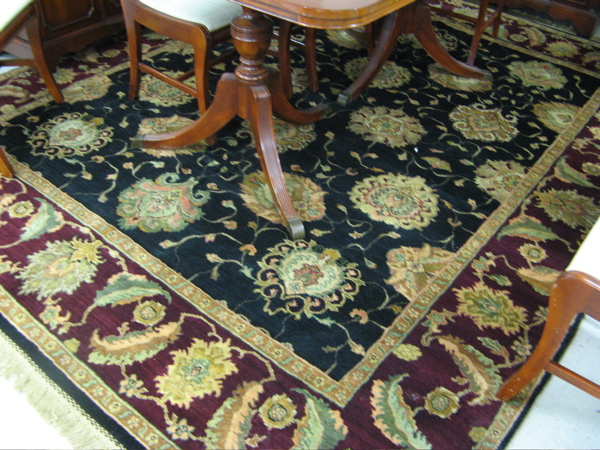 Appraisal: HAND KNOTTED ORIENTAL CARPET Indo-Persian overall floral arabesque design on