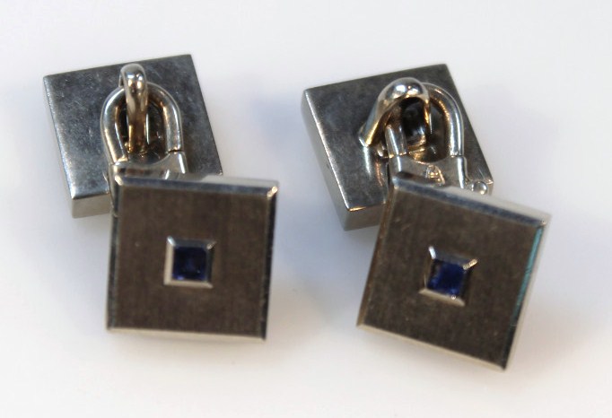 Appraisal: A pair of cufflinks each with square ends set with