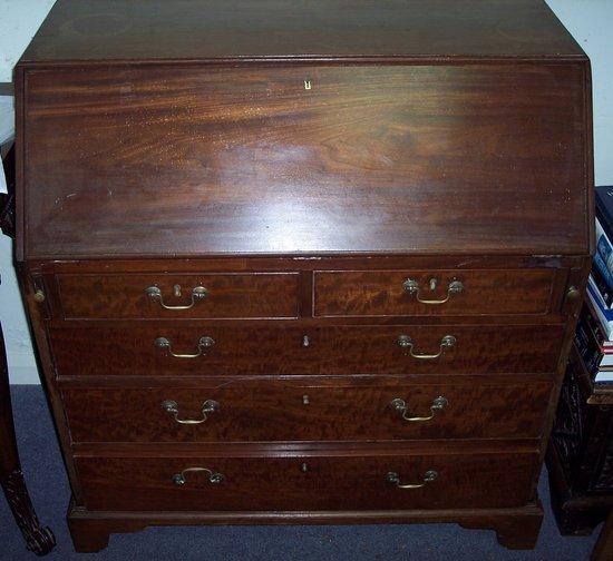 Appraisal: A th Century mahogany bureau the fall front enclosing a