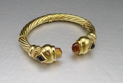 Appraisal: K CITRINE GARNET CUFF BRACELET K yellow gold hinged cuff