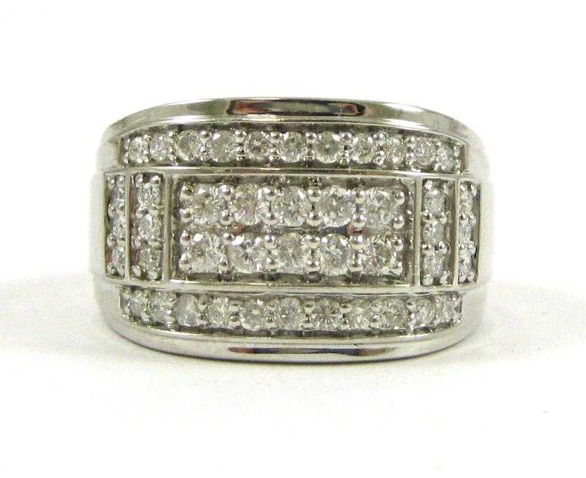 Appraisal: MAN'S DIAMOND AND TEN KARAT WHITE GOLD RING set with