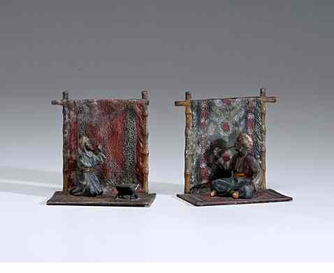 Appraisal: Cold-painted Bronze Bookends Continental a pair of metal cold-painted bookends