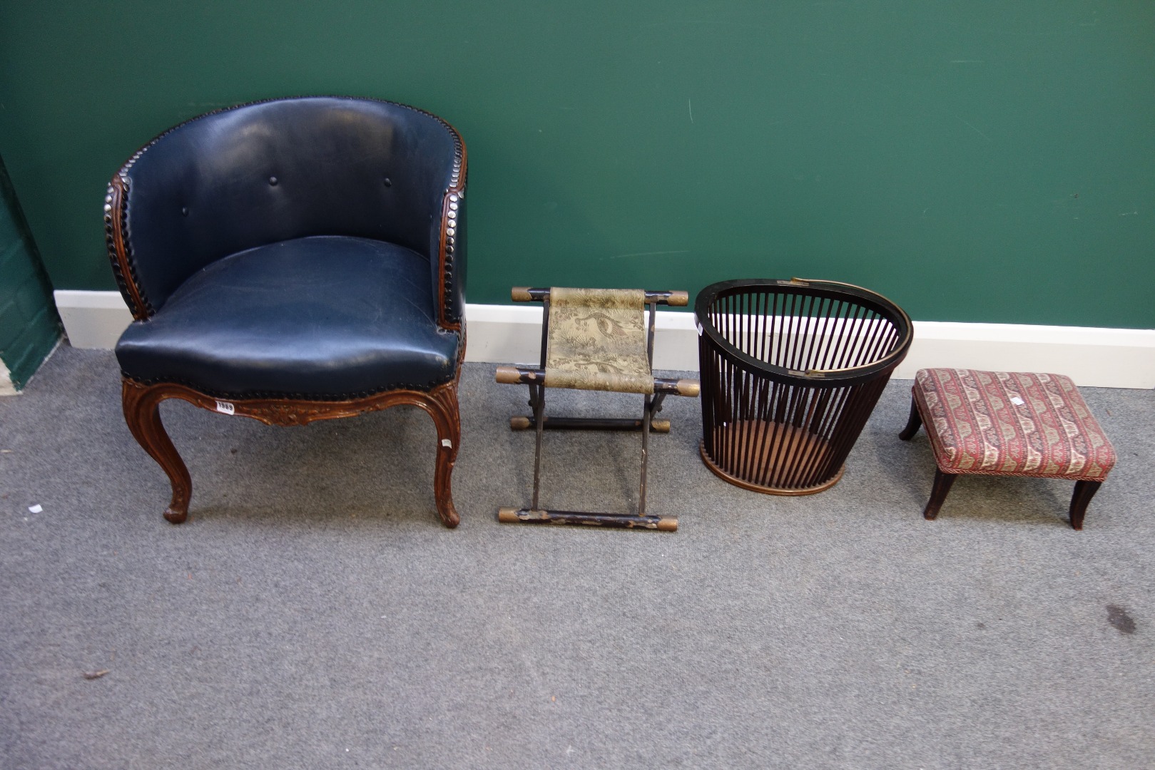 Appraisal: A French th century style leather upholstered low tub chair