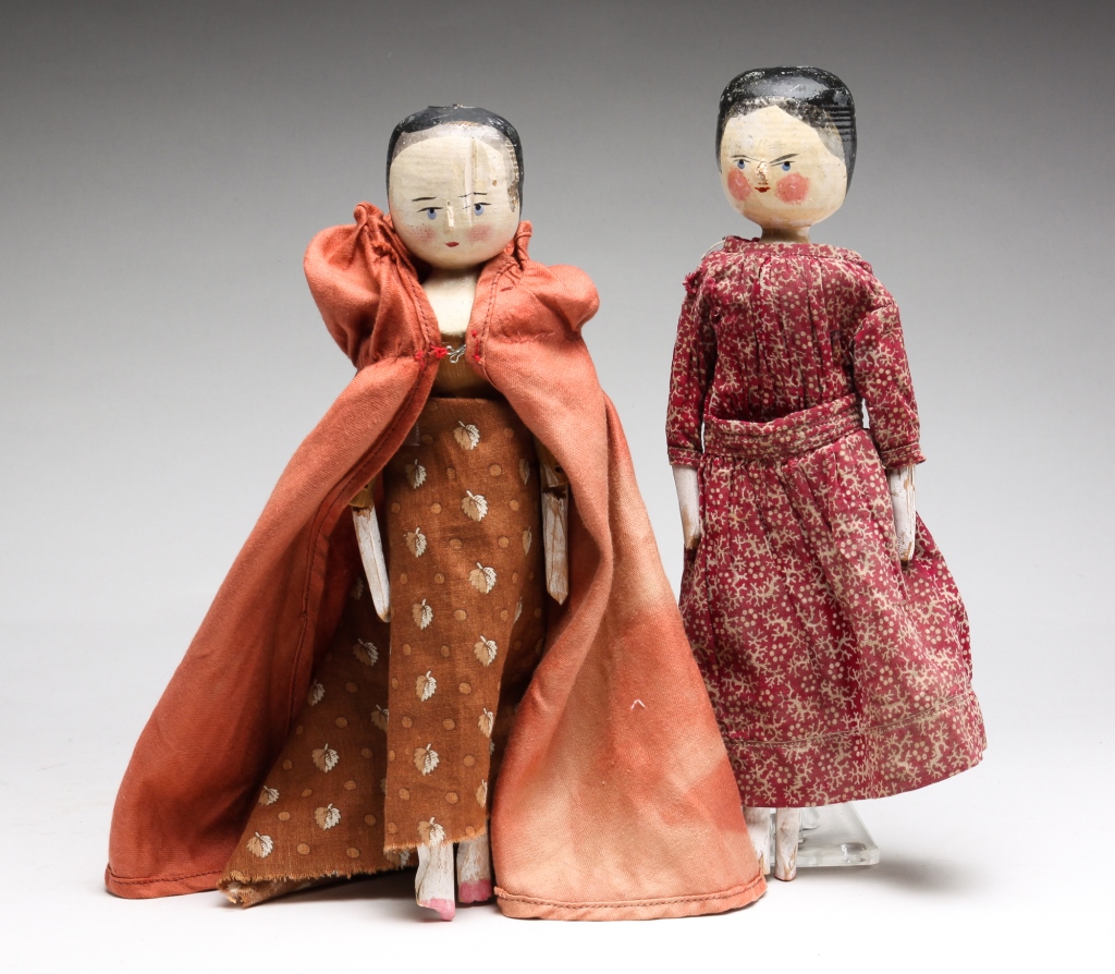 Appraisal: TWO GERMAN WOOD PENNY DOLLS Late th century Heads have