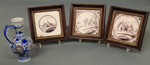 Appraisal: Three Delft type framed tiles and a German stoneware ewer