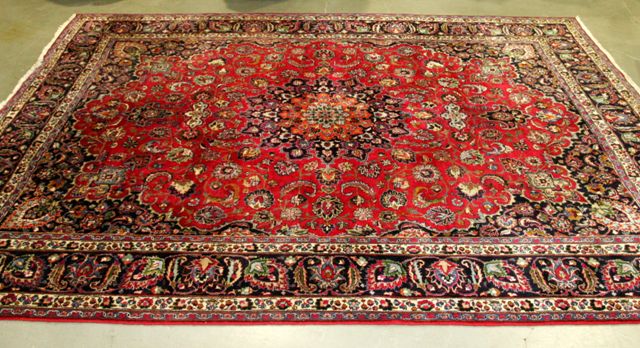 Appraisal: A Tabriz carpet in shades of red and cobalt with