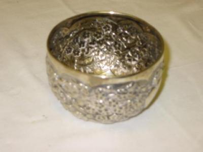 Appraisal: A VICTORIAN SUGAR BOWL of circular form with embossed flowers