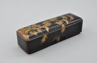 Appraisal: A Japanese Lacquerware Covered Box Oblong in shape with rounded