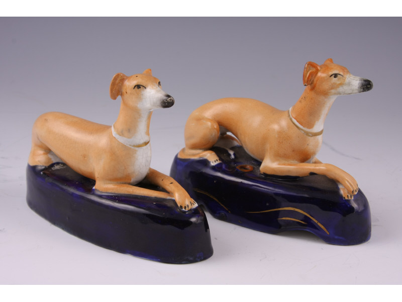 Appraisal: Pair of Staffordshire Dog Pen Holders English ca - the