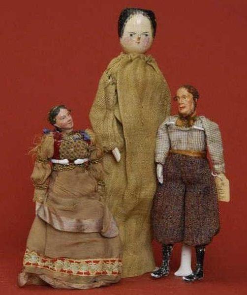 Appraisal: Lot Three Dolls Lot includes pair of marionette type dolls