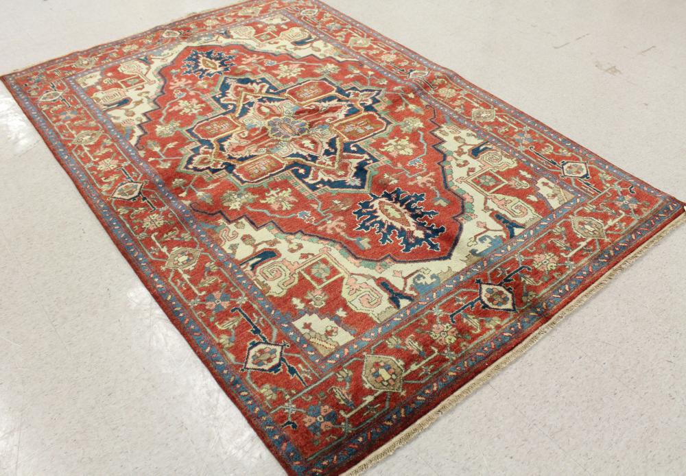 Appraisal: HAND KNOTTED ORIENTAL CARPET Persian Serapi or Heriz design featuring