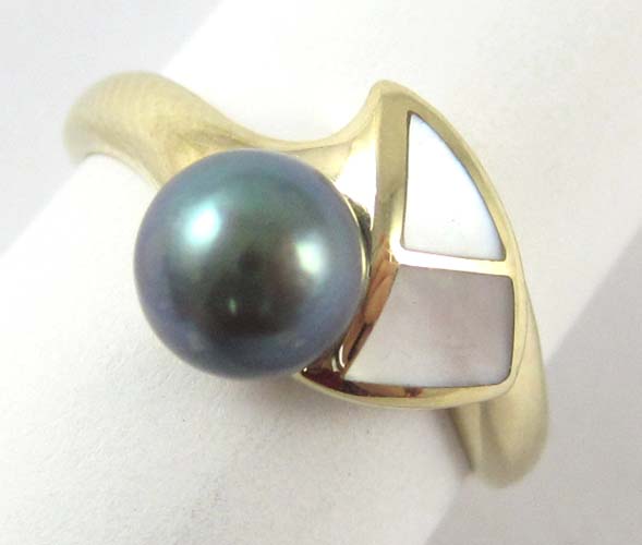 Appraisal: BLACK PEARL AND MOTHER-OF-PEARL RING k yellow gold inlaid with