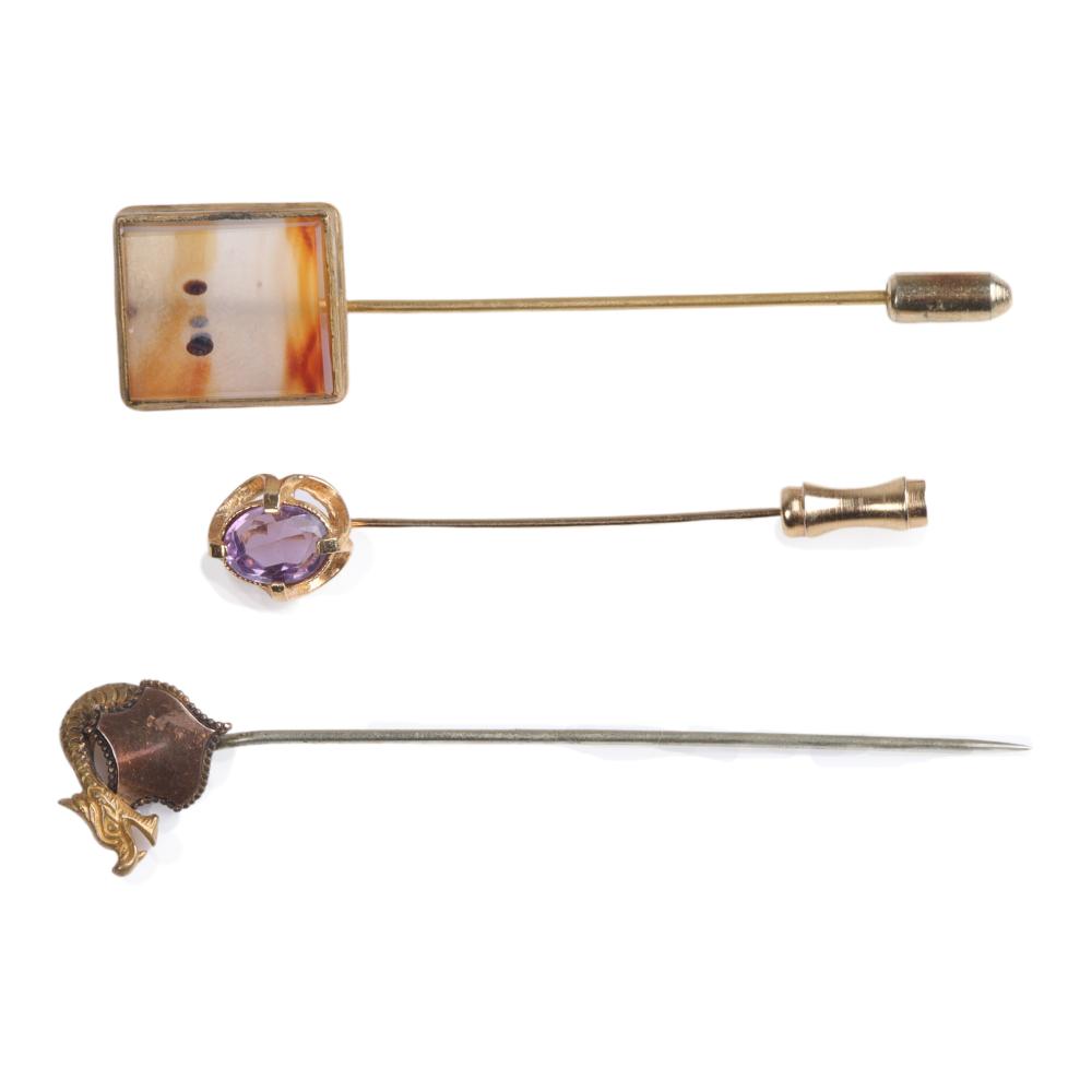 Appraisal: Three Victorian gold stick pins amethyst stick pin with scalloped