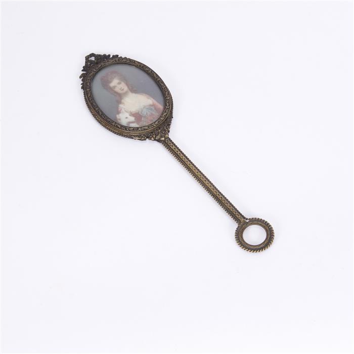 Appraisal: Bronze hand mirror with a portrait miniature on ivory of