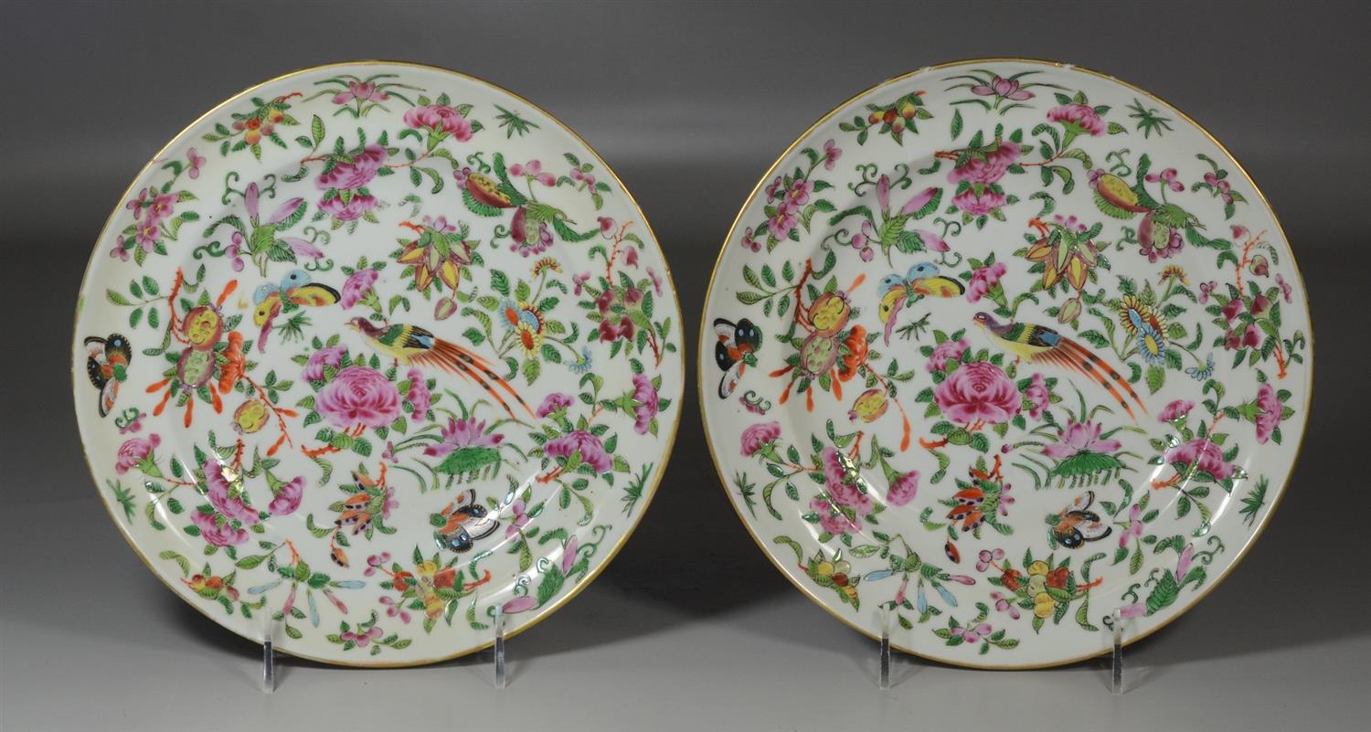 Appraisal: Pair of Famille Rose shallow soup bowls with bird and