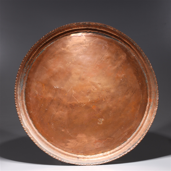 Appraisal: Large antique Indian copper charger with scalloped molded rim th