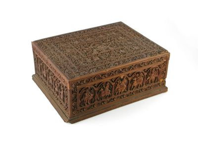 Appraisal: An Indian hardwood box and cover finely carved with figures