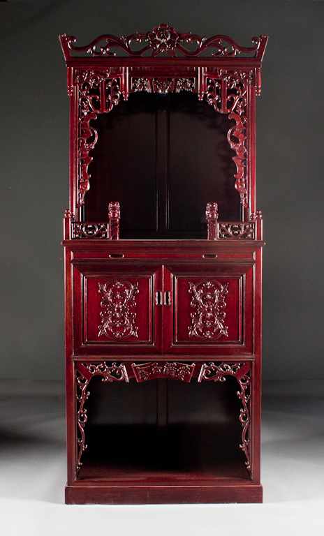 Appraisal: Chinese carved hardwood display cabinet th century two cabinet doors