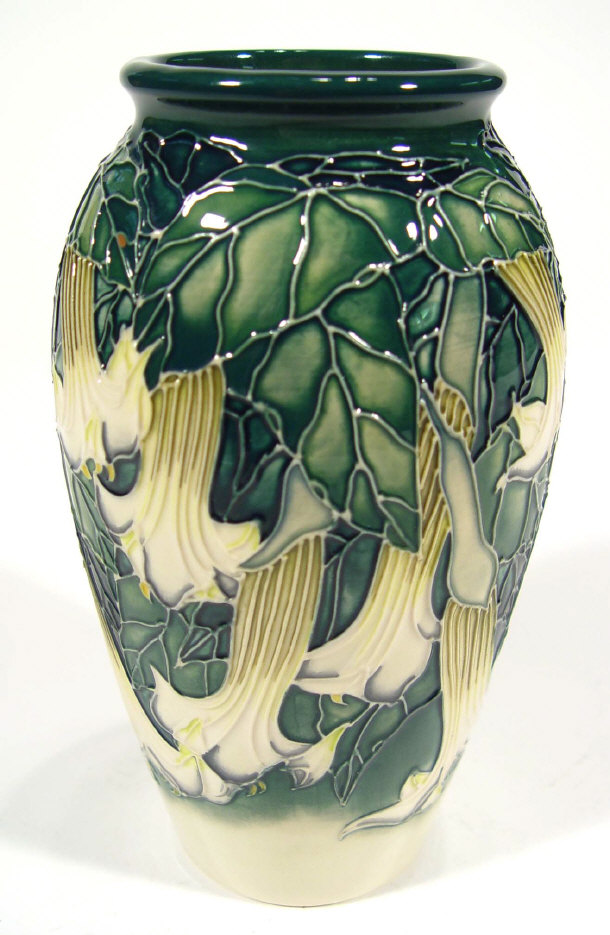 Appraisal: Moorcroft pottery vase hand painted with white flowers onto a