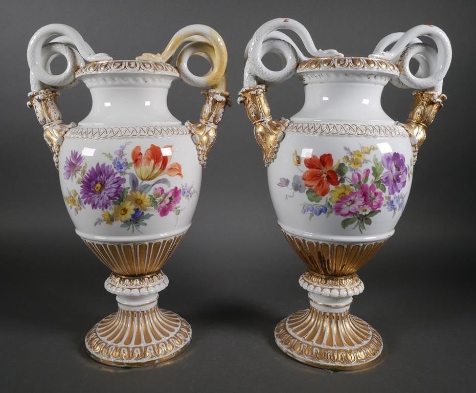 Appraisal: Classical vases with double snake handles ornate gilding and hand