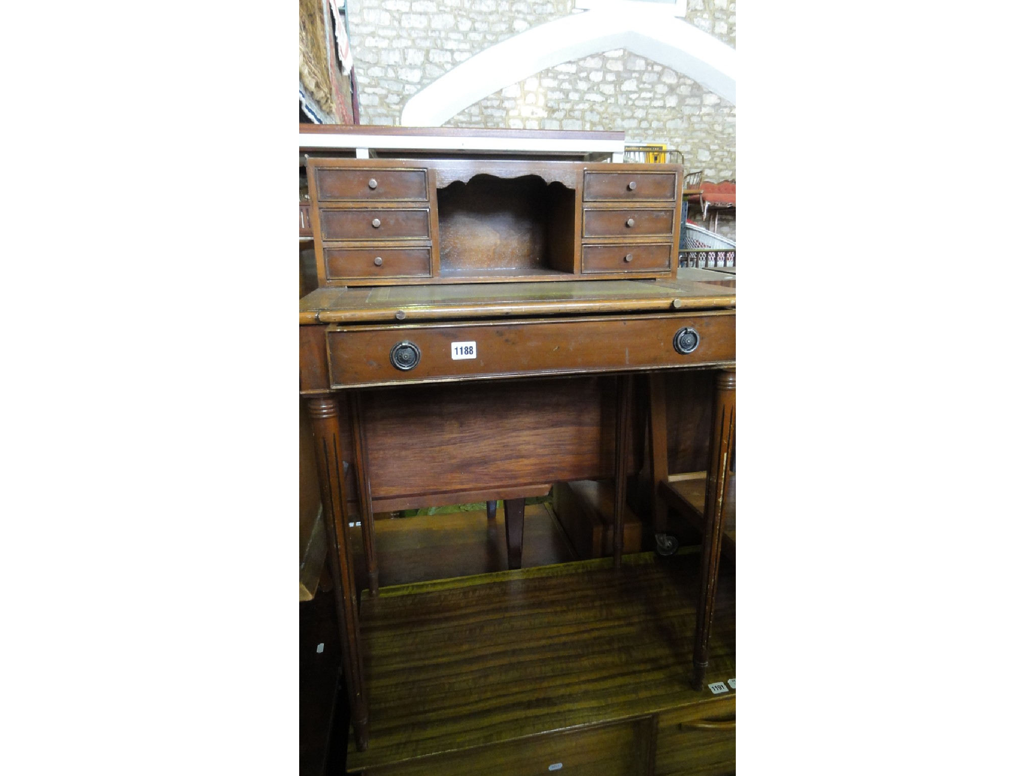 Appraisal: A small reproduction yew wood veneered writing desk the raised