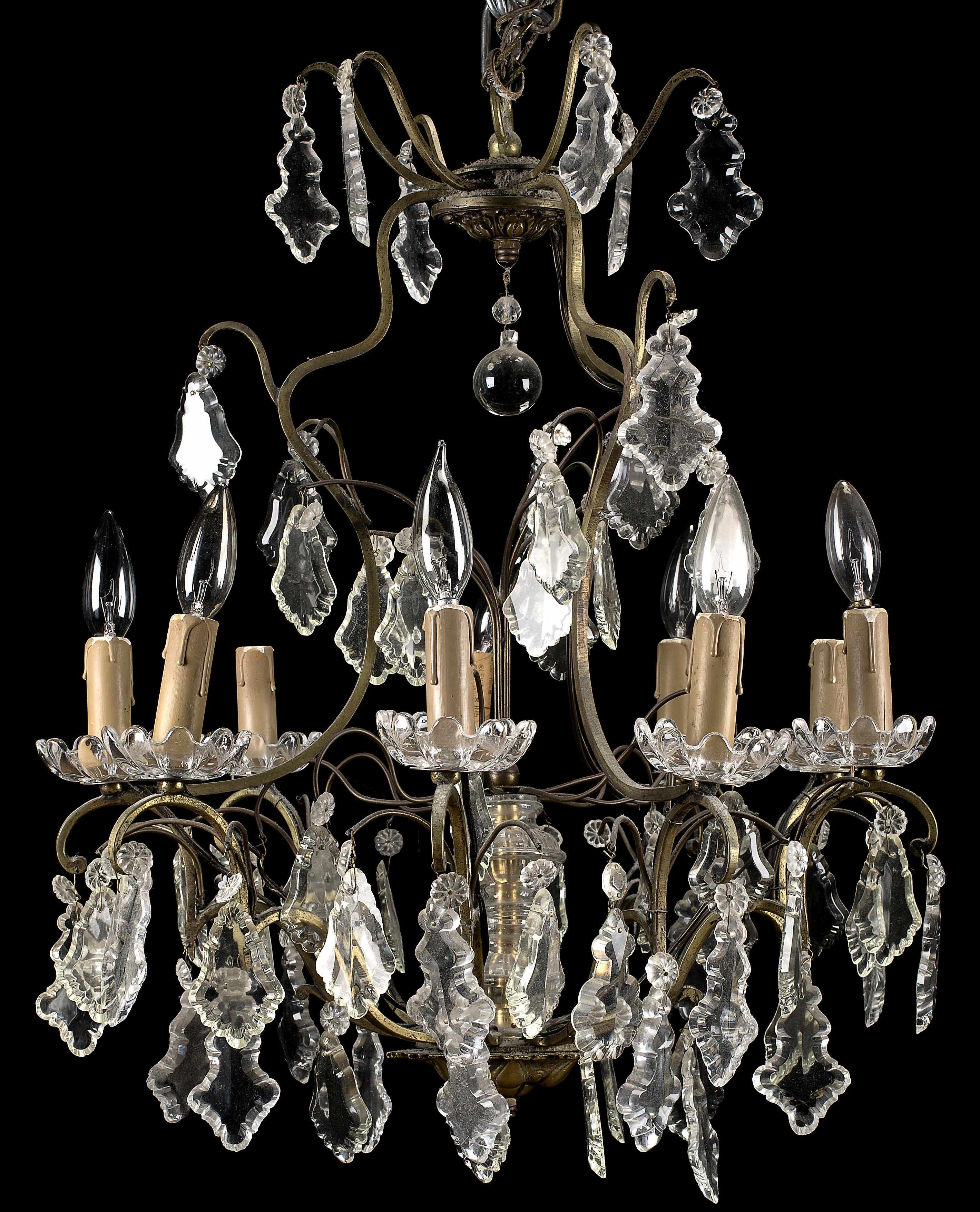 Appraisal: A Louis XV style brass and molded glass nine light