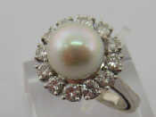 Appraisal: A white metal tests carat gold untested pearl and diamond