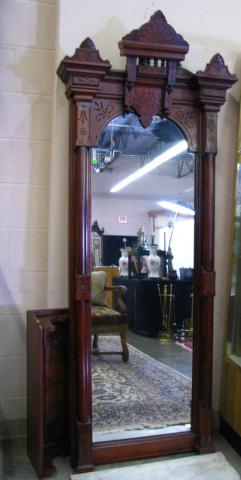 Appraisal: Eastlake Walnut Pier Mirror with wall mounted base having white