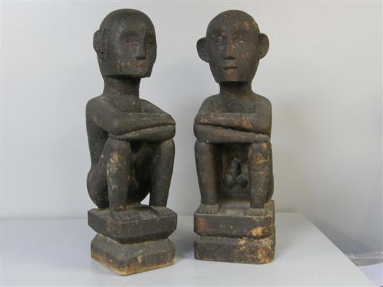 Appraisal: Pair of African carved statues of a man and woman