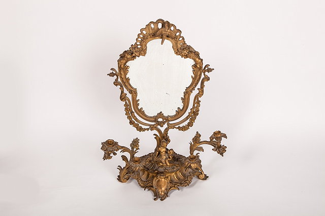 Appraisal: A TH CENTURY FRENCH GILT METAL TABLE MIRROR of Rococo