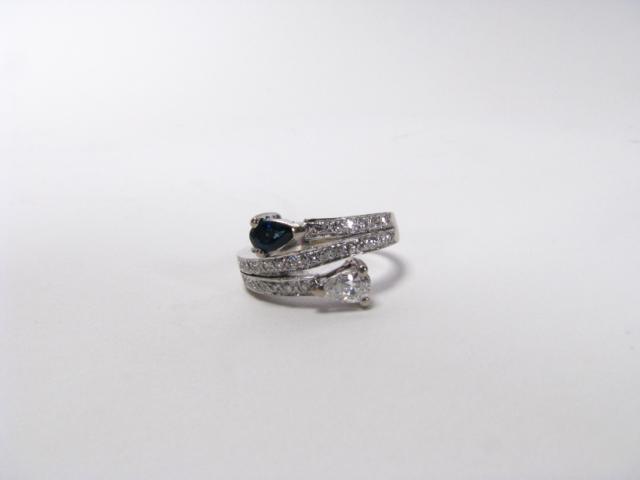 Appraisal: K white gold ring with one each trillion-cut diamond and