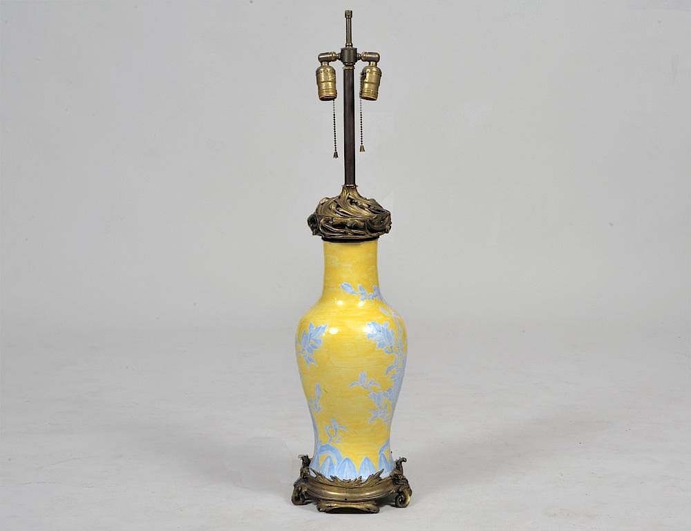 Appraisal: YELLOW GROUND PORCELAIN VASE LAMP With blue floral design metal