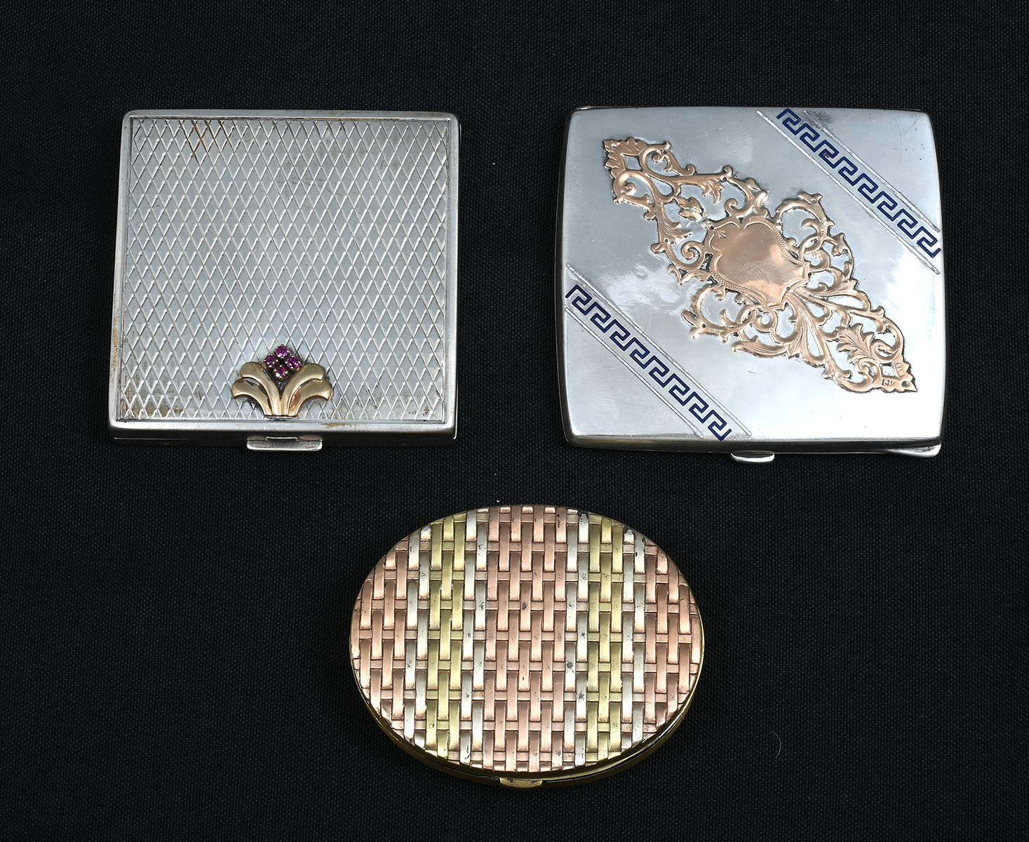 Appraisal: PC SILVER GOLD COMPACTS Comprising - Evans basket weave motif