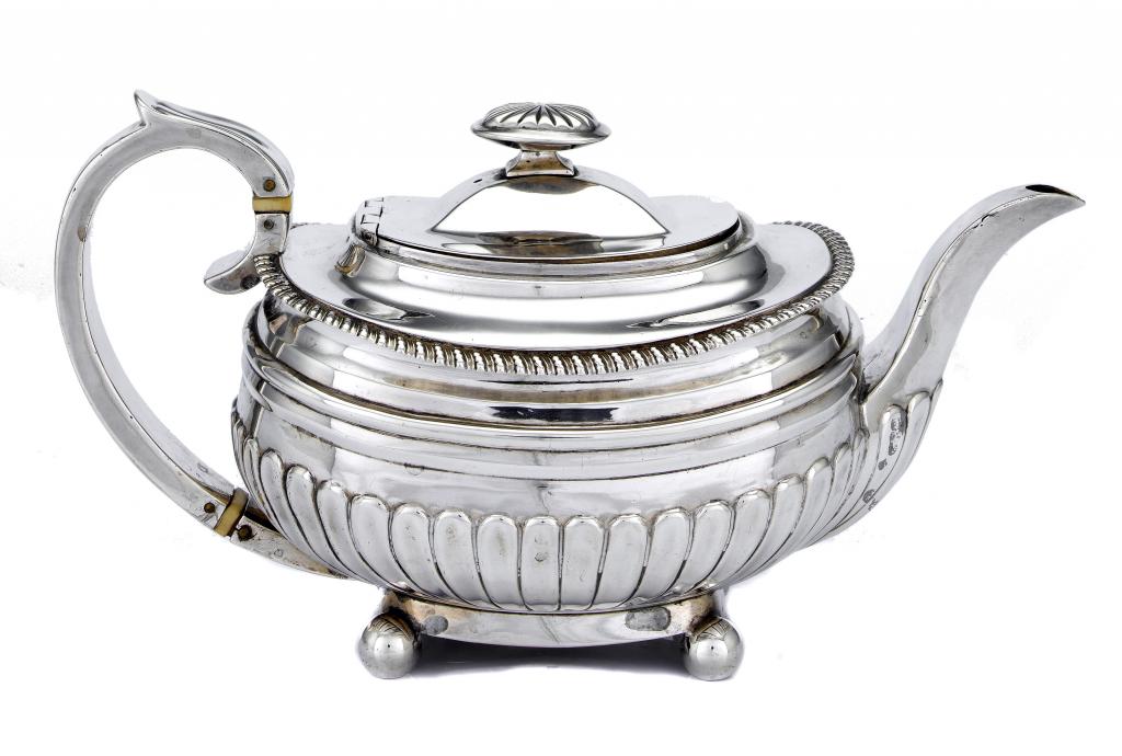 Appraisal: A GEORGE III TEAPOT the domed lid with integral hinge