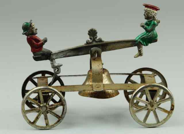 Appraisal: JACK AND JILL ON SEESAW BELL TOY Watrous Mfg cast