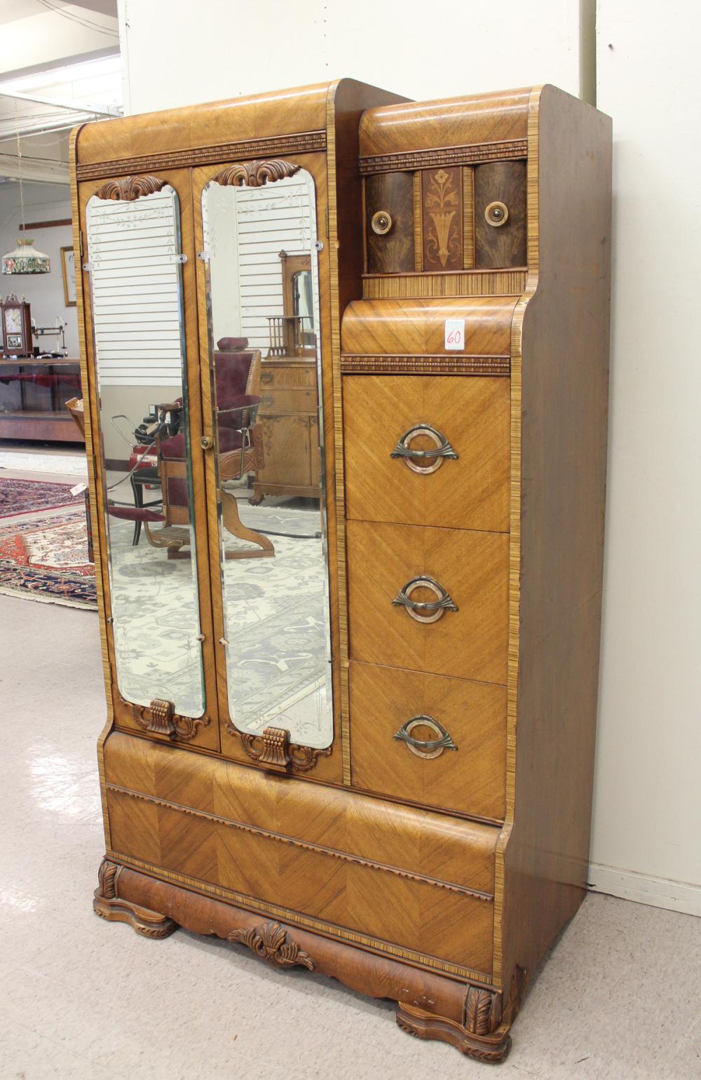 Appraisal: WALNUT AND MAHOGANY 'WATERFALL' WARDROBE American c - s the