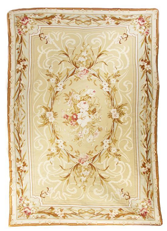 Appraisal: n Aubusson Carpet having floral decoration throughout on a beige