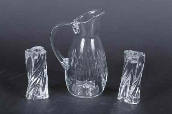 Appraisal: THREE PIECES BACCARAT GLASS Including pitcher and pair candlesticks -