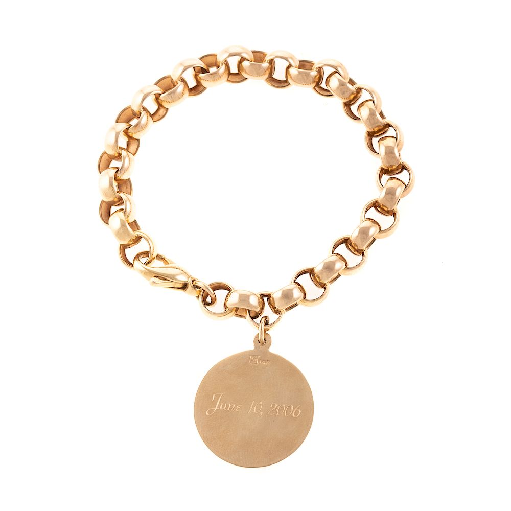 Appraisal: A Large K Round Link Charm Bracelet with Charm K