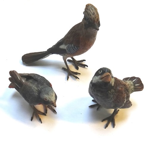 Appraisal: Three Austrian cold painted bronze birds th century comprising a