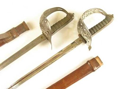 Appraisal: A Victorian Officer's dress sword with an etched blade by