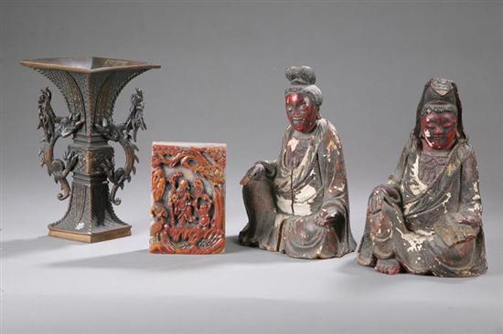 Appraisal: FOUR PIECES Two seated figures of robed immortals One has