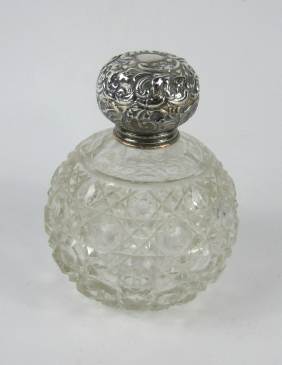 Appraisal: A George V hobnail cut scent bottle with an embossed