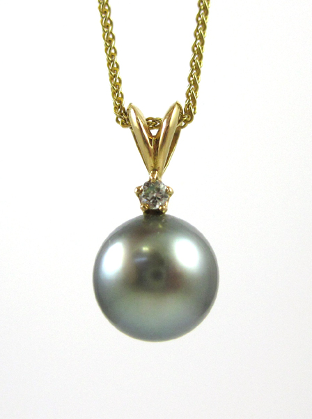 Appraisal: BLACK PEARL AND DIAMOND PENDANT NECKLACE suspended on a -