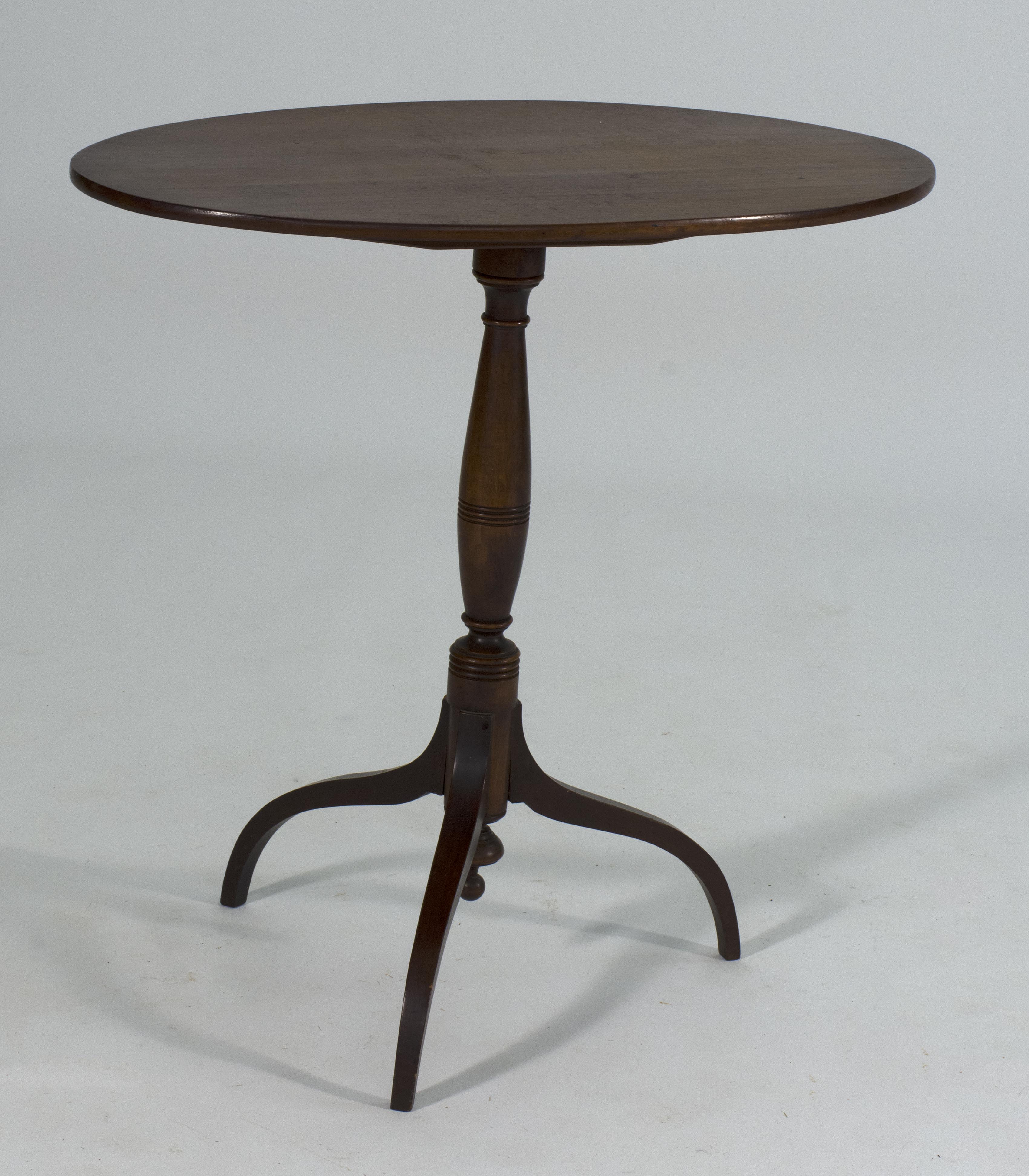 Appraisal: QUEEN ANNE-STYLE TILT-TOP CANDLESTAND th CenturyIn mahogany Elongated oval top