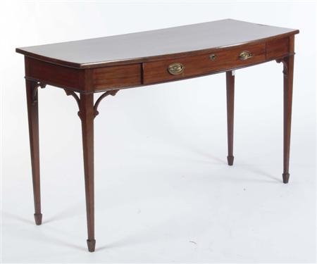 Appraisal: An early th century mahogany bowfront serving table the shaped