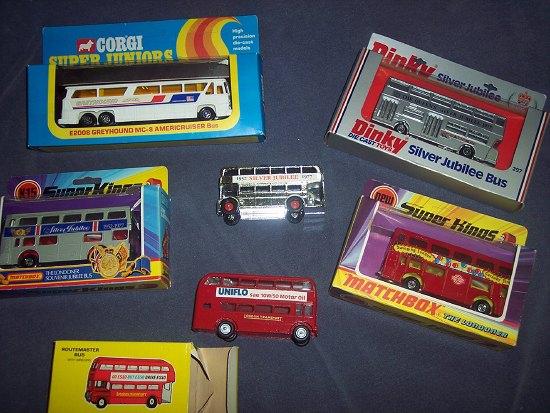 Appraisal: Dinky Toys No Silver Jubilee Bus and other buses boxed