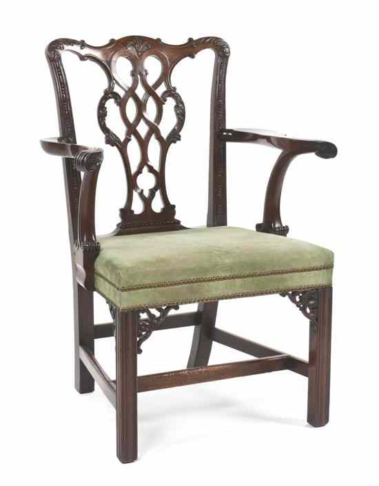 Appraisal: A George III Mahogany Open Armchair having a vertical pierce