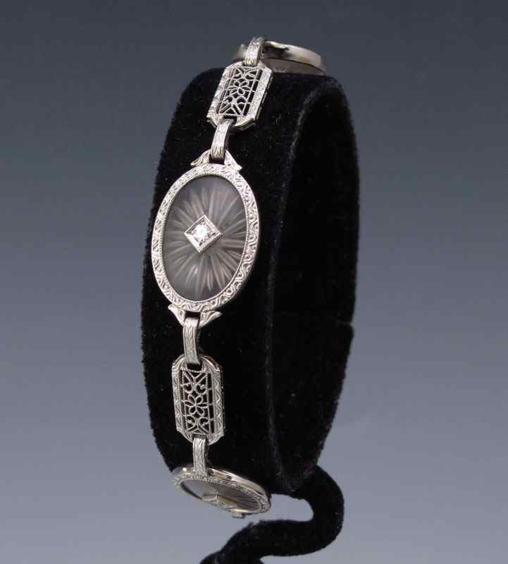 Appraisal: K CRYSTAL AND DIAMOND FILIGREE BRACELET K white gold bracelet