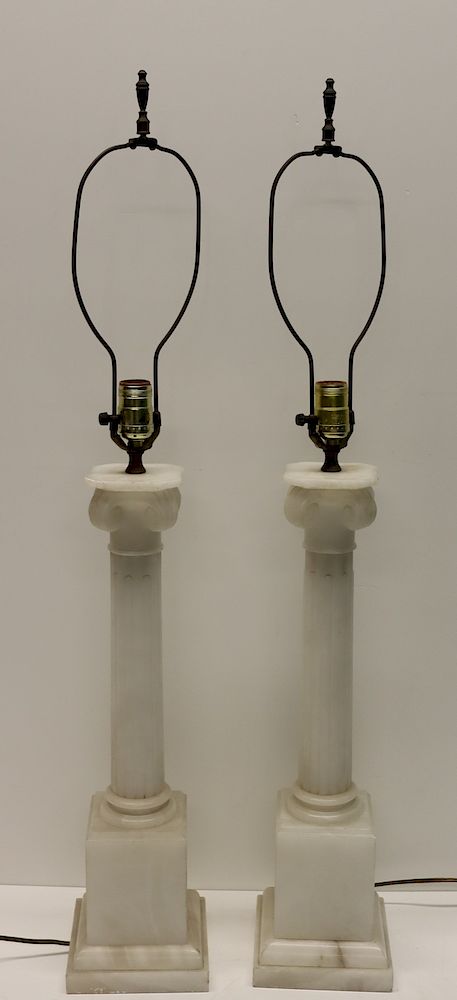 Appraisal: Pair Of Antique Carved Marble Column Form Lamps From a